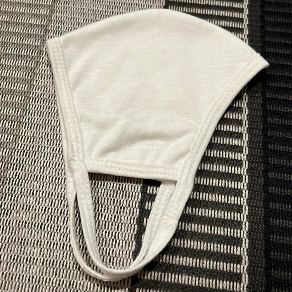 Reusable soft cotton face mask in white. NWOT. Offers welcome